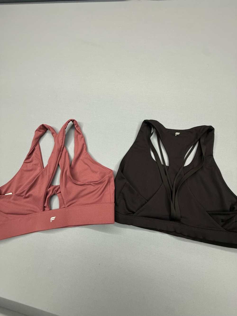 Fabletics Dual-Pack Racerback Sports Bras in Dusty Rose and Black - Picture 2 of 3